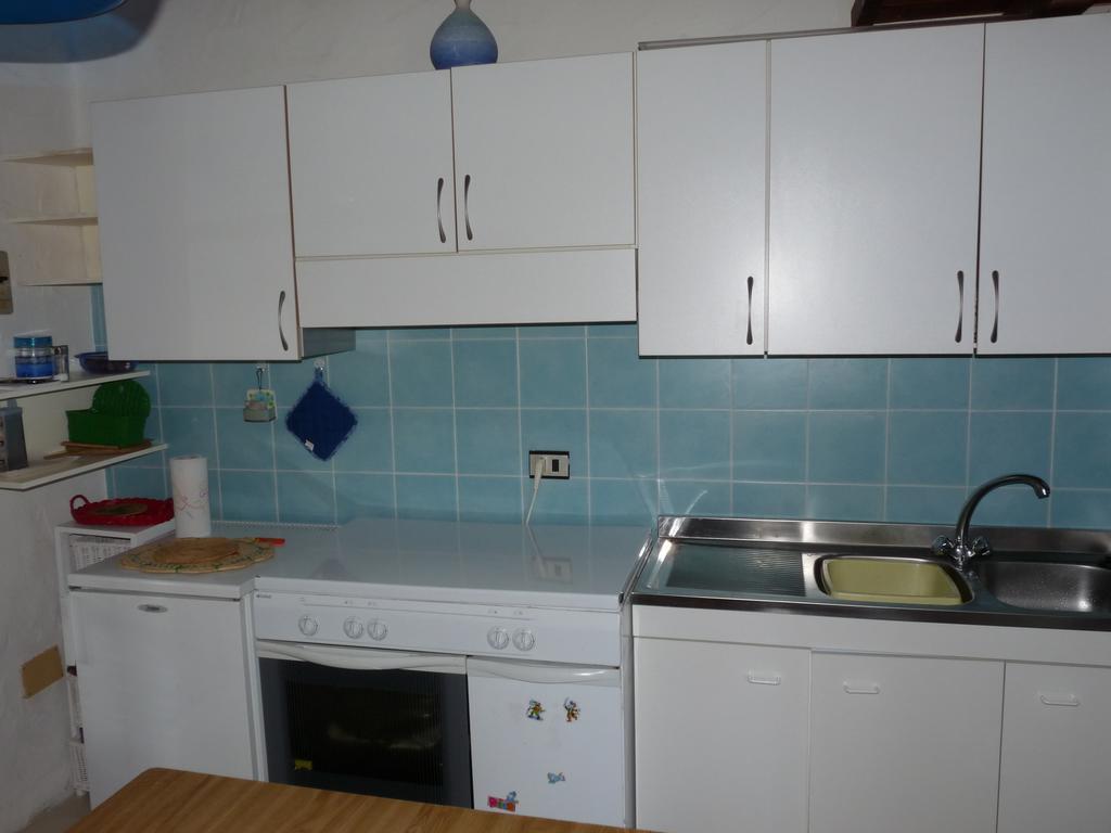 Monolocale San Teodoro Apartment Ruang foto