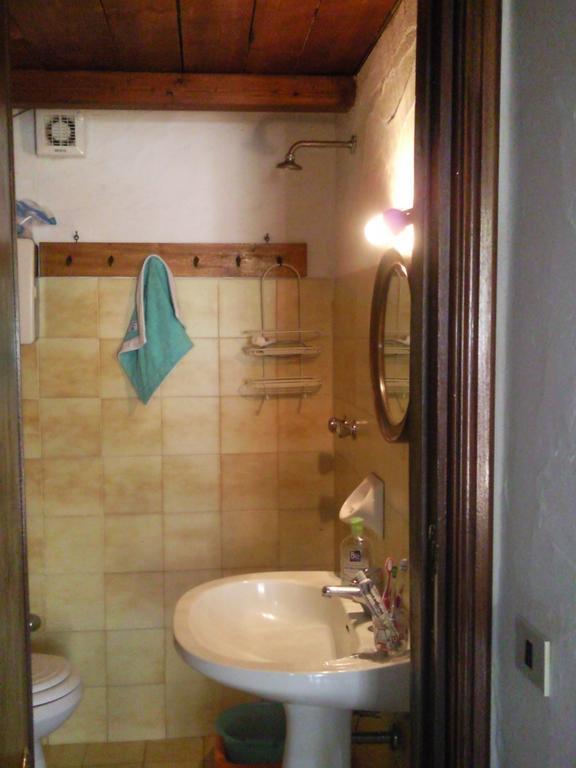 Monolocale San Teodoro Apartment Ruang foto
